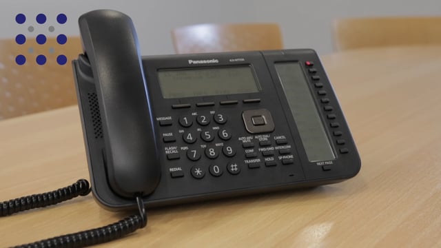 how to set time on panasonic landline phone